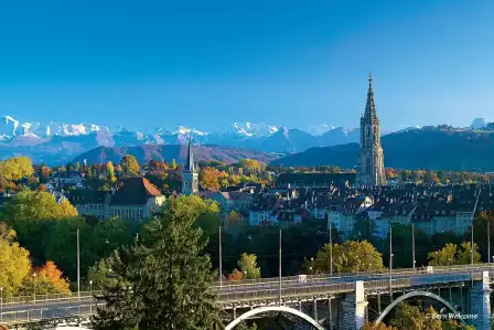 Bern Cathedral  with the Berner Oberland snowy mountains in the backdrop